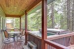 Deck with hot tub, table and grill